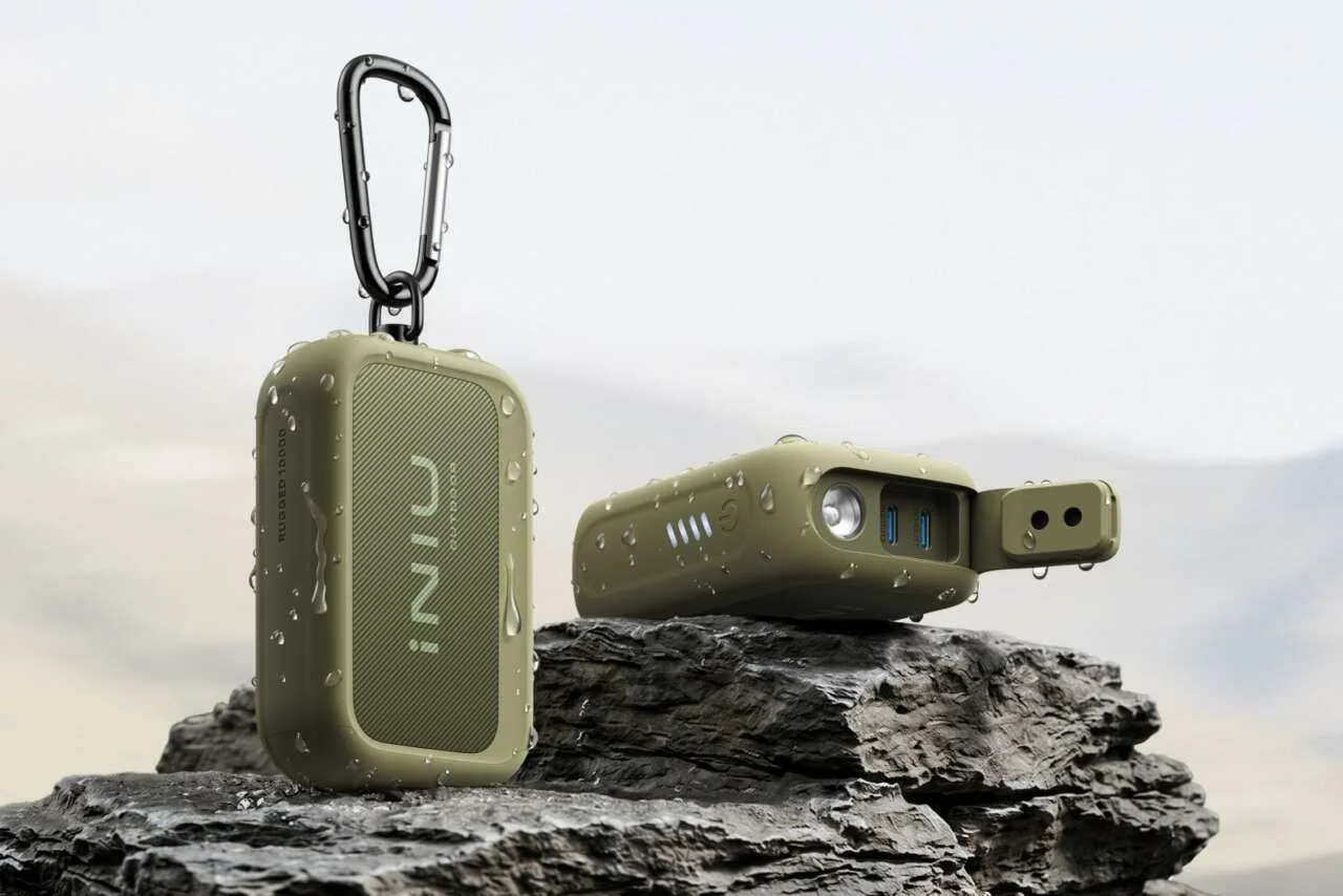 INIU Outdoor Rugged 10000 power banks in Ranger Green on rocks